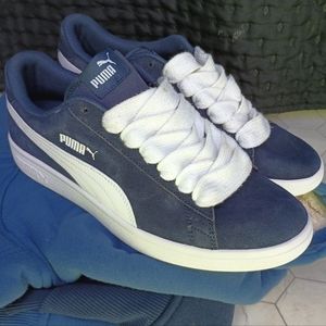 classic navy Puma sneakers with fat laces